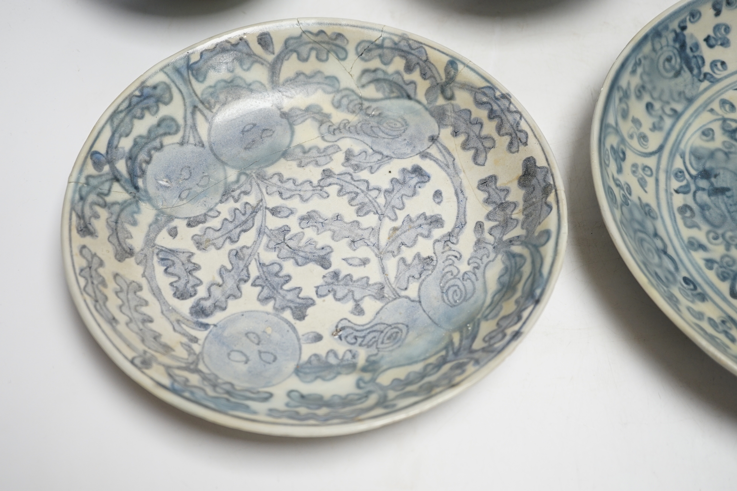 Chinese Ming dynasty shipwreck ceramics - three blue and white pottery bowls and three dishes, largest 25cm diameter